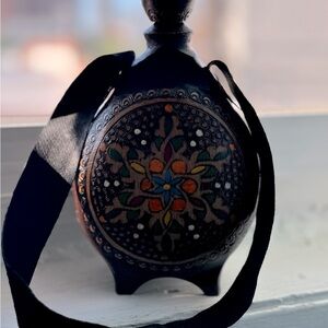 Vintage wooden vessel. Handmade with leather strap